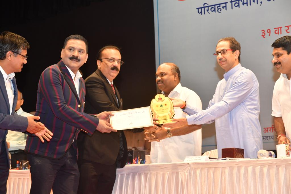 Gaikwad receiving award from Uddhav Thackeray, the 19th Chief Minister of Maharashtra